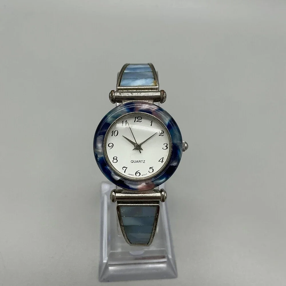 Avon F69038-1/P Women Watch 27mm Silver Tone Blue Bezel Stretch Band New Battery